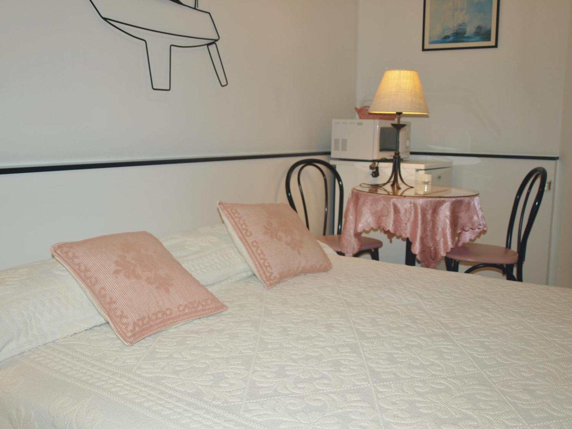 Hotel La Conchiglia Ла Мадалена Стая снимка